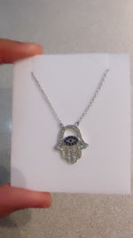 Load and play video in Gallery viewer, Arti - Dainty &amp; Stunning - 18k White Gold Plated Swarovski Crystal Hamsa Evil Eye Necklace - New for 2024
